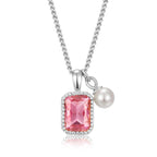 Collier mit edler Anhängerkombination - pinker Baguette Stein, Perle, Herz